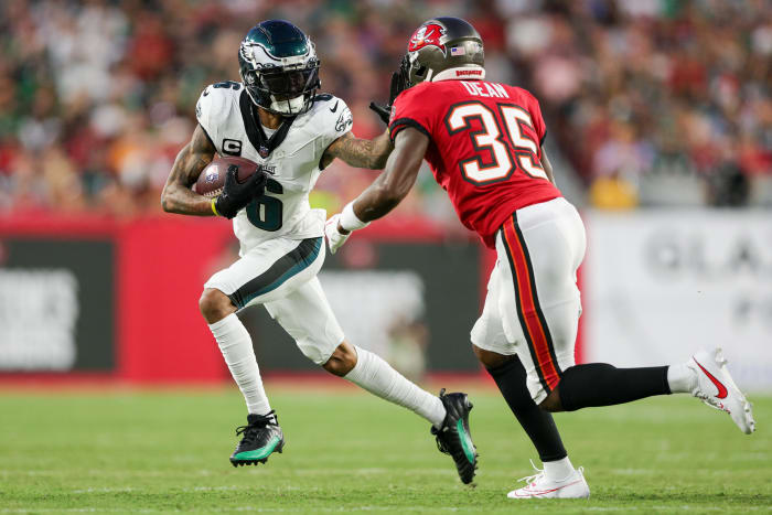 Philadelphia Eagles wide receiver DeVonta Smith (6) stiff arms Tampa Bay Buccaneers cornerback Jamel Dean (35) in the first quarter at Raymond James Stadium.
